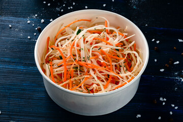 Bowl of coleslaw with shredded cabbage