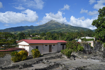 Ruins in front of a big volcano