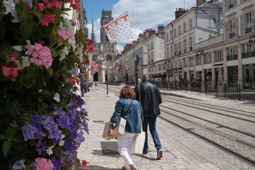 Fototapeta na wymiar people and flowers in Orlean, France