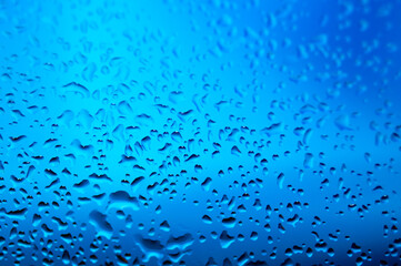 air bubbles in the water isolated on blue background