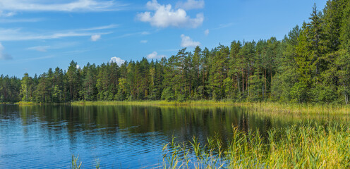 Panoramic view of beautiful forest lake in Russia. - 430468794