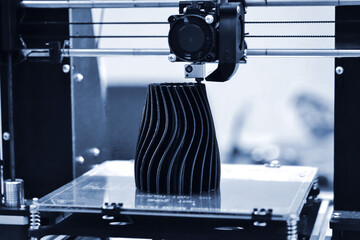 The process of working 3D printer and creating a three-dimensional object