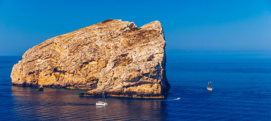 View from Capo Caccia on island Isola Foradada, Sardinia, Italy. Island Foradada at 