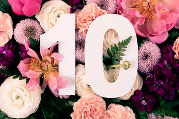 Layout with colorful flowers, leaves and number ten. Chrysanthemum Momoko, Peony, Matthiola,...