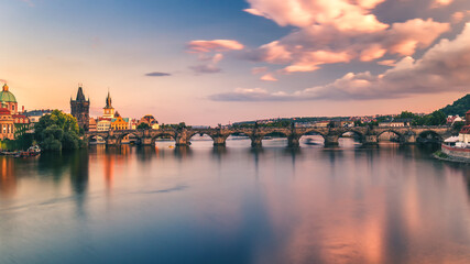 Famous iconic image of Charles bridge, Prague, Czech Republic. Concept of world travel, sightseeing and tourism.