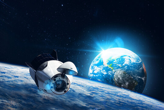 Space   station on orbit of the Earth planet and universe background. Elements of this image furnished by NASA