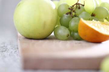 sweet fresh apples and grape on the table juicy fruits