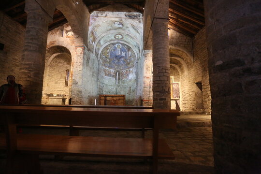 Lleida, Spain, May 1, 2020 - ensemble fresco paintings Pantocrator and interior Church Sant Climent de Taull. Catalan History of Middle Ages. UNESCO heritage. Romanesque period Christian frescoes