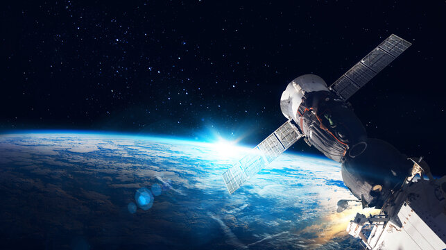 Space   station on orbit of the Earth planet and universe background. Elements of this image furnished by NASA - Powered by Adobe