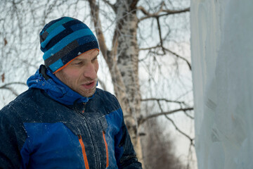 Portrait of the artist in blue overalls