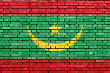 flag of Mauritania painted on brick wall