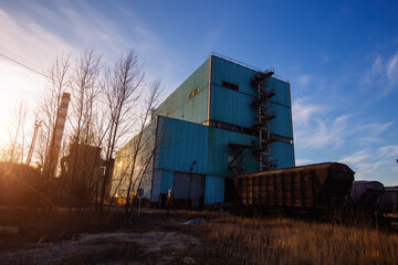 Fototapeta na wymiar Old rusty freight train at metallurgical factory