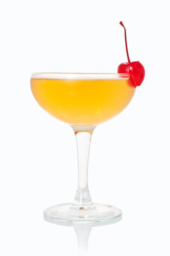 alcoholic cocktail in a glass on white background