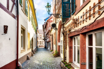 Fototapeta na wymiar Narrow street in the old town of Neustadt an der Weinstrasse in the Pfalz, Germany