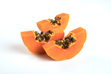 Fresh papaya sliced isolated on white background .
