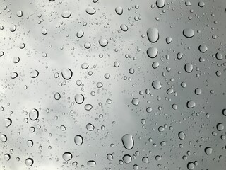 rain water drops on the window glass texture.