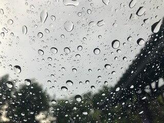 rain water drops on the window glass texture.