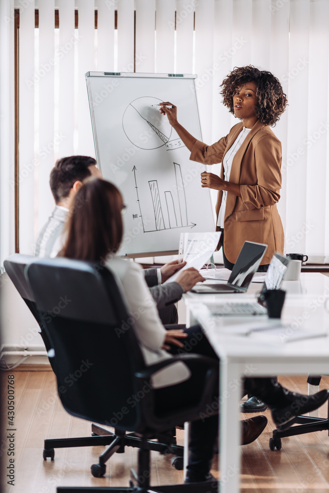 Sticker businesswoman giving presentation to her colleagues