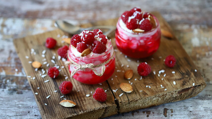 Coconut yogurt with raspberries and raspberry jam. Healthy dessert. Vegan food. The keto diet.