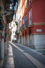 Fototapeta na wymiar Verona, Italy, 07.04.2019: view of Nicolo Ponte Nuovo street in located in the historical part of the city.