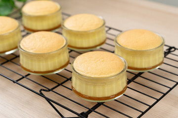 Caramel custard pudding cake in glass bowl