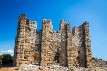 An antique ruined house  ruin city. Basilica, dating from the 3rd century AD, at Aspendos ancient site in Turkey.