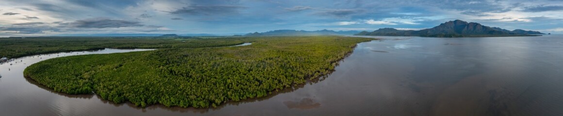 Naklejka premium Panoramic view of the Enterprise Channel and Hinchinbrook Island captured at Lucinda in Far North Queensland, Australia