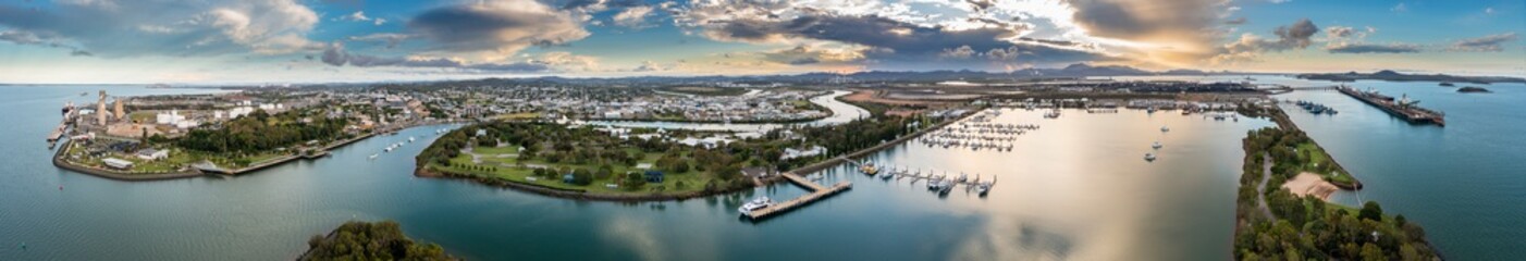 Fototapeta premium Aerial panoramic dusk view of Gladstone town and port in Queensland Australia