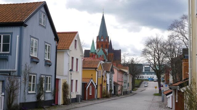 View Of Saint Peter Church (Sankt Petri Kyrka) From A Village In Vastervik, Kalmar, Sweden. wide shot