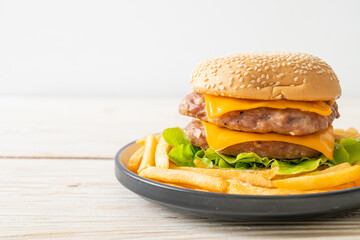 pork burger with cheese and french fries