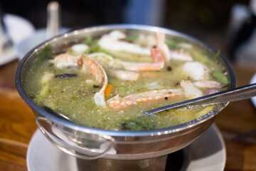 Tom Yum seafood in a hot pot. Thai cuisine