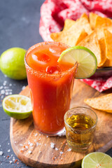 Mexican alcohol cocktail Chavela served with tequila shot