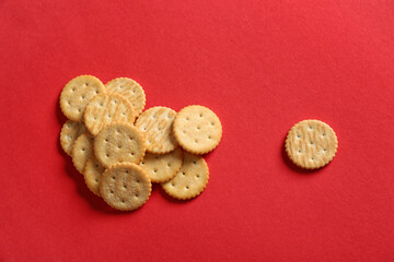 Tasty crackers on color background