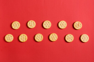 Tasty crackers on color background