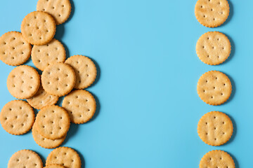 Tasty crackers on color background