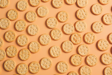 Tasty crackers on color background