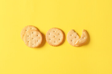 Tasty crackers on color background