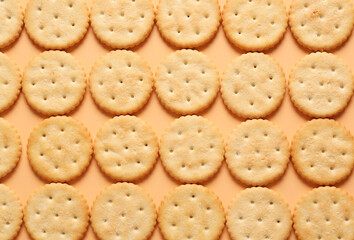 Tasty crackers on color background