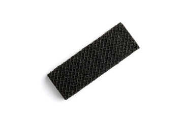 Black wafer isolated on white background. Top view.