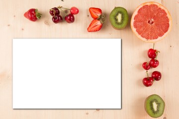 Spring slice some fruits on wooden background Mock up grapefruit kiwi cherry strawberry fruit on table wood Top view and mockup