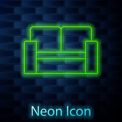 Glowing neon line Cinema chair icon isolated on brick wall background. Vector