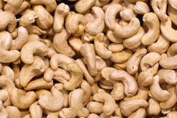 Сashew nuts, piled in bulk, in food market.