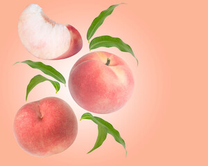 Fresh Peach fruit with leaf isolated on Peach colour background With clipping path,