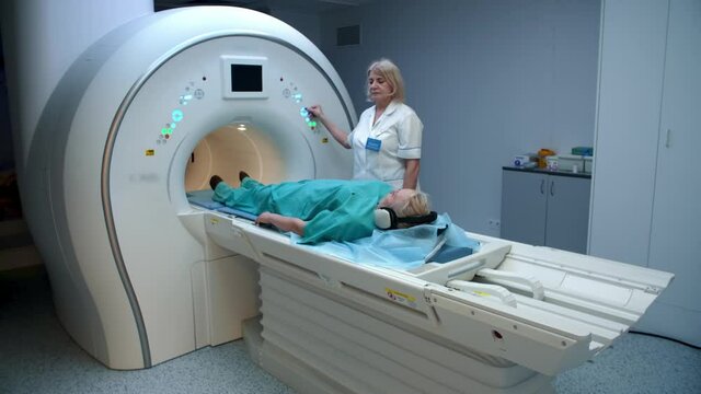 Patient senior woman during mri scan