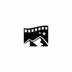 Fototapeta na wymiar mountain Video Film Production Logo suitable for video, film or similar industry. A smart negative space logo with a mountain on a film strip.