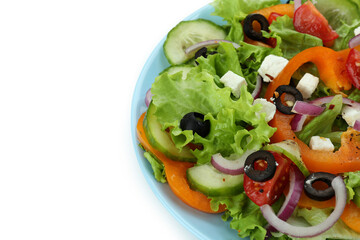 Plate of greek salad isolated on white background