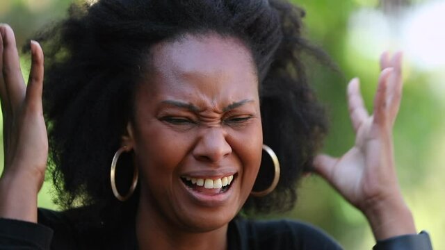 Frustrated black woman scared expression. Emotional angry in horror