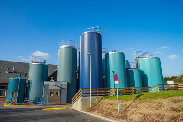 Arla department in gjesing 21 Apr. 2021 Here are blue stainless steel cylinders which contain cow's milk