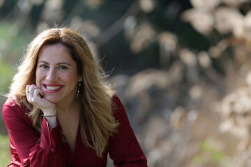 woman portrait outdoors with red dress