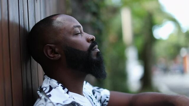 Pensive black man thinking about life. Contemplative African guy